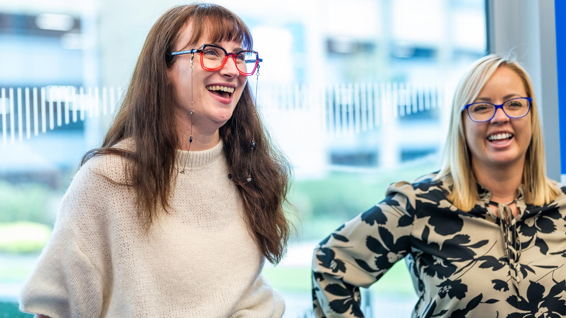 Two women smiling