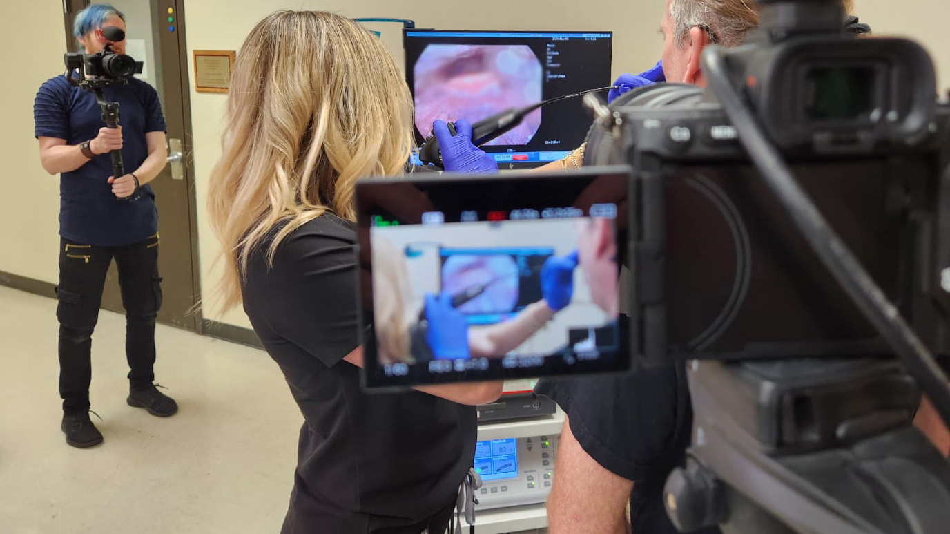 A singer undergoes some vocal assessment on camera