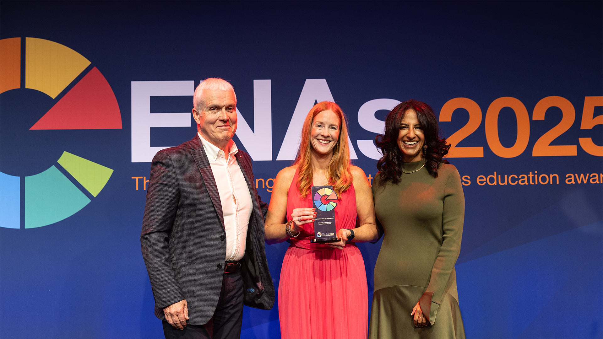Claire Aydogan accepting an award at the Educate North Awards 2025