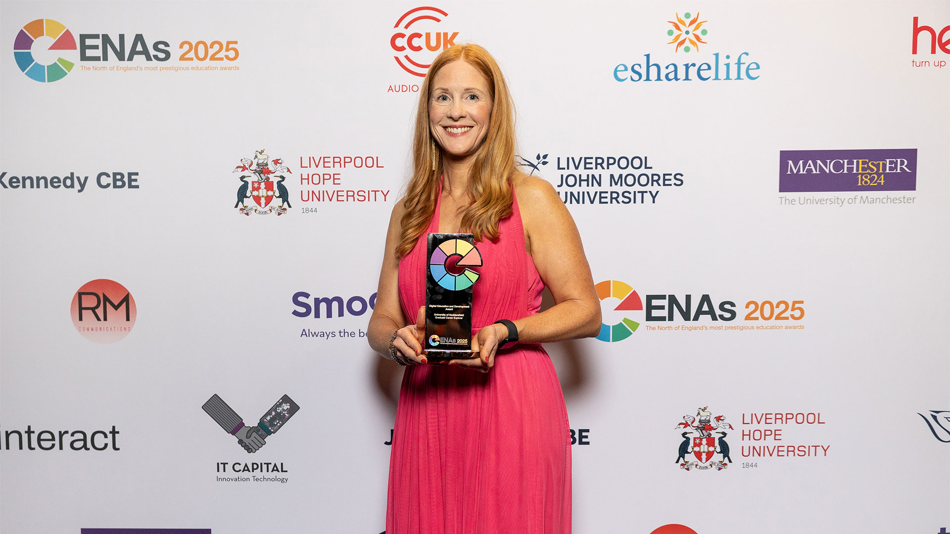 Claire Aydogan accepting an award at the Educate North Awards 2025