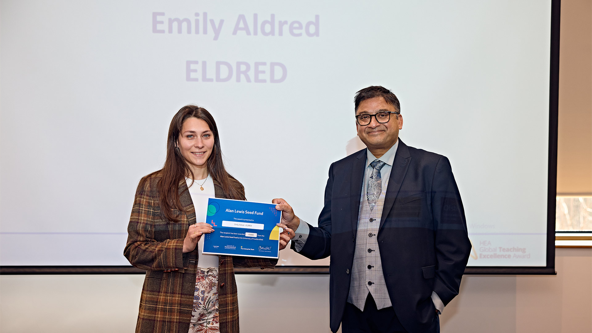 A student being presented with an award