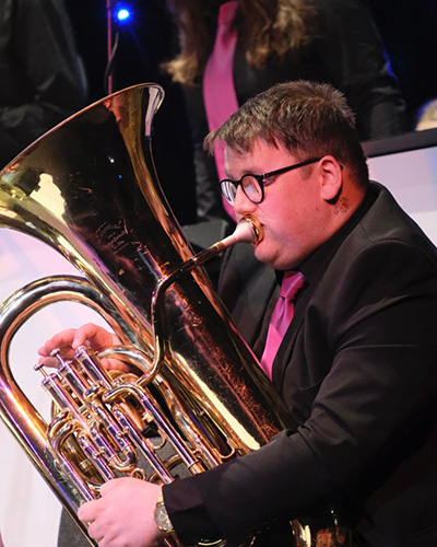 Adrian Austin playing his tuba