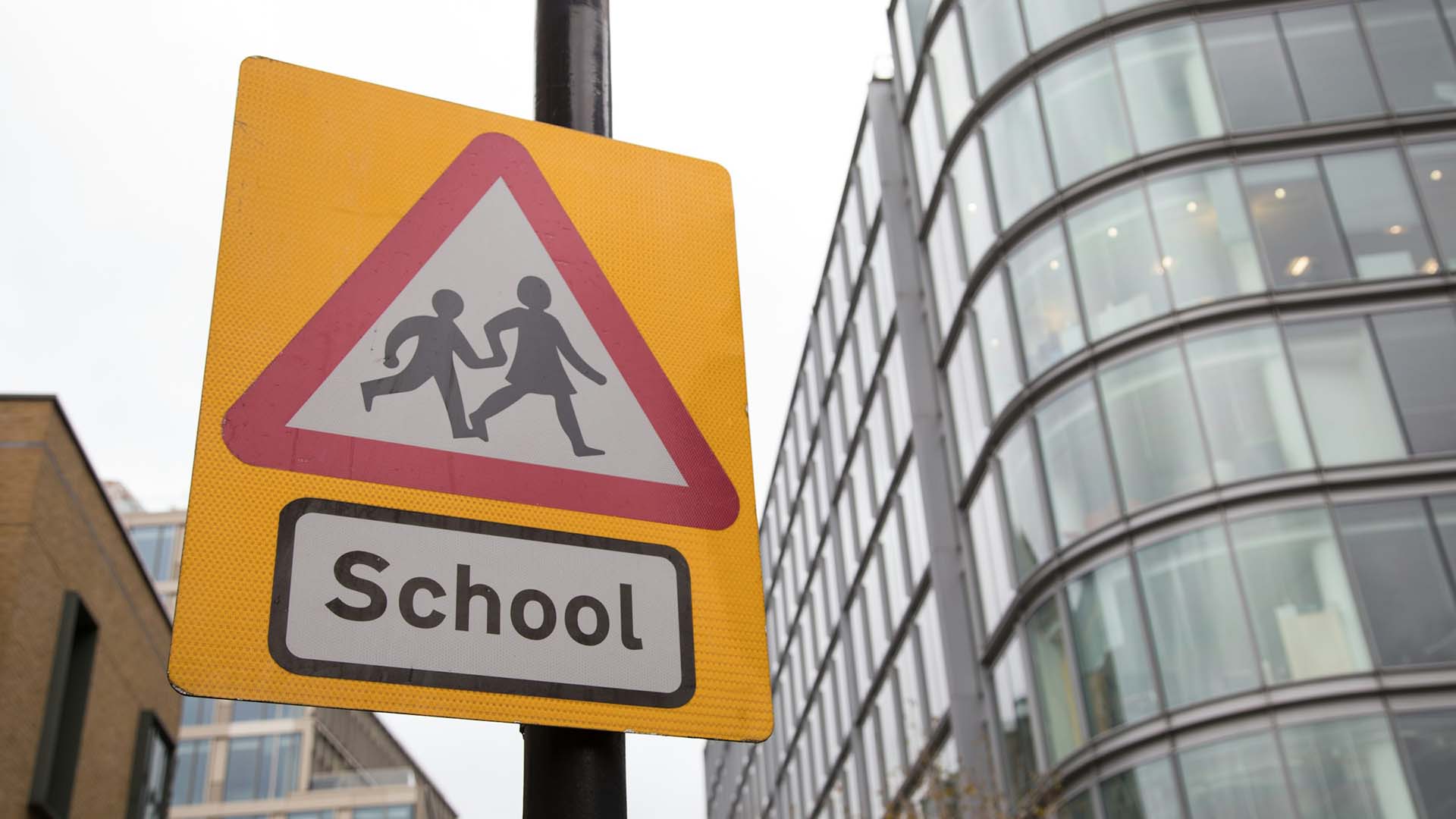 A standard British school sign
