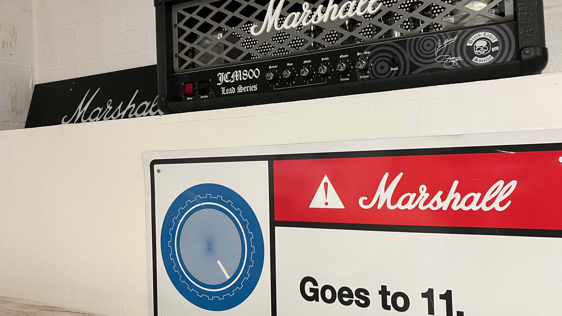 A Marshall amp and a sign