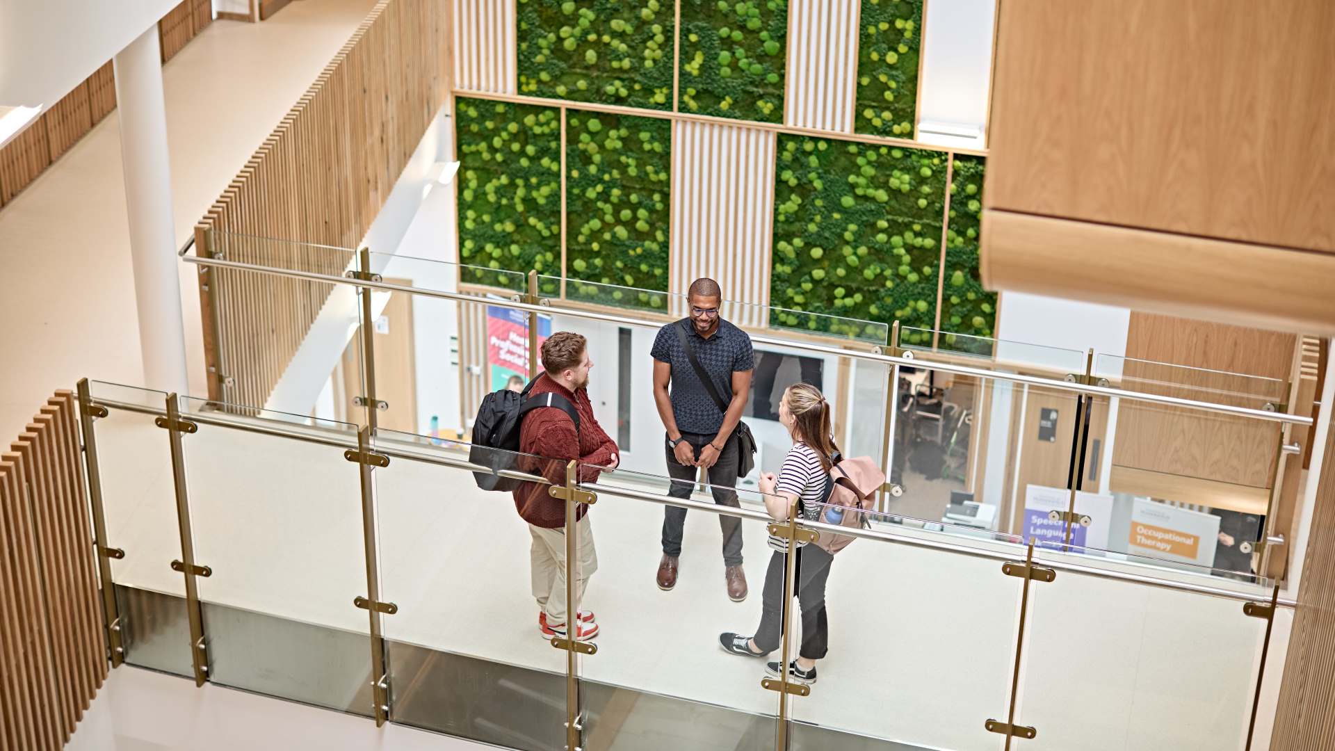 Some young people talk to each other in the Daphne Steele Building