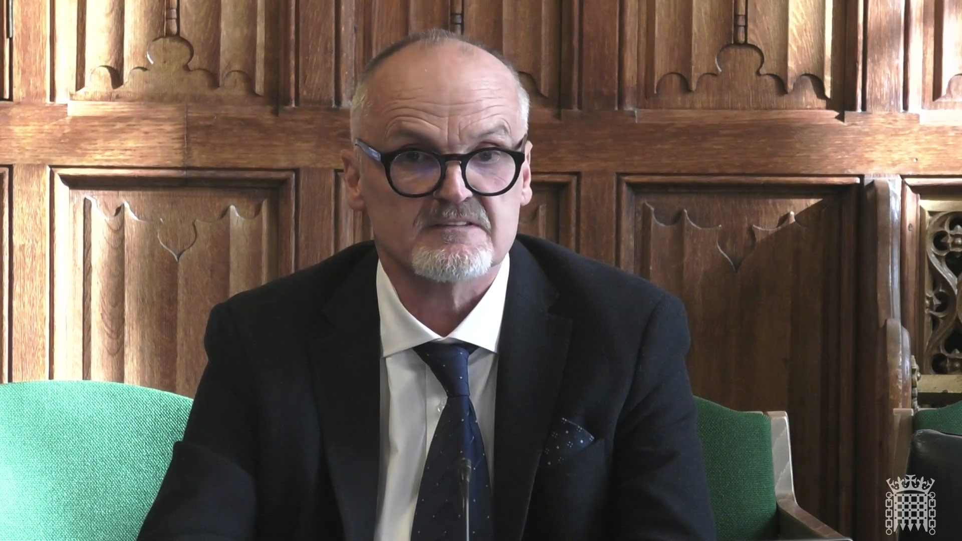 Professor Liam Blunt speaking before a Parliamentary Committee