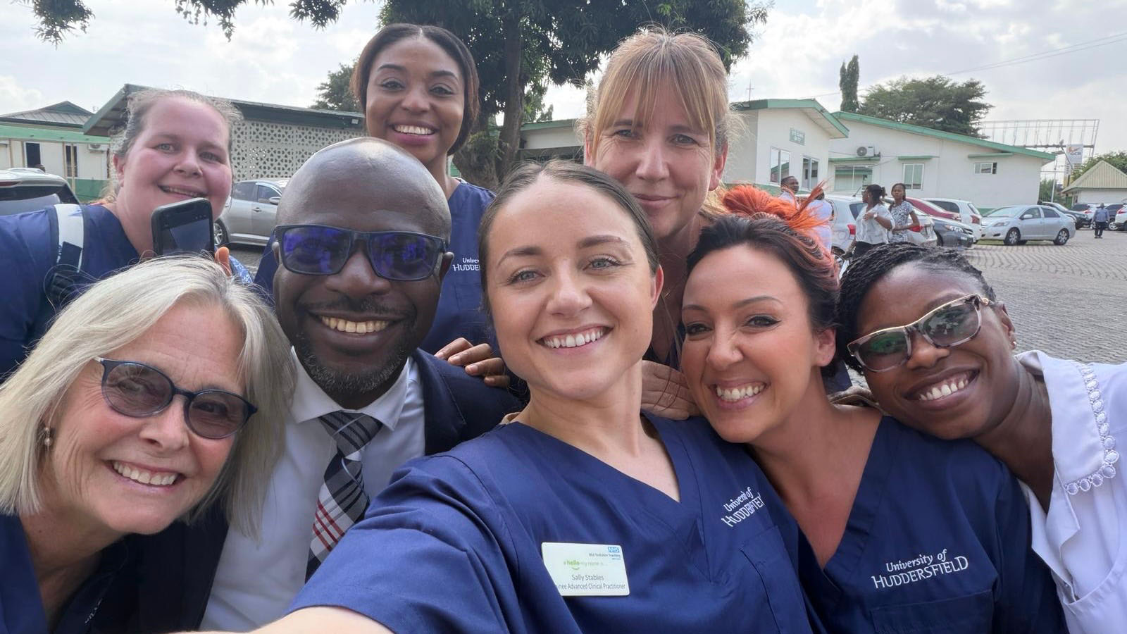 Staff and students from Huddersfield and Kwame Nkrumah University of Science and Technology smile in a selfie