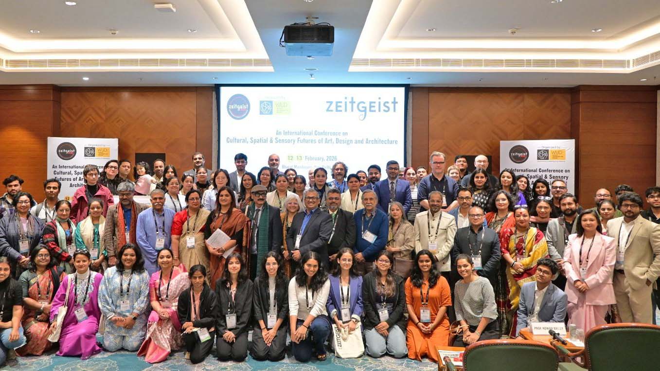 Zeitgeist conference delegates smile at the camera