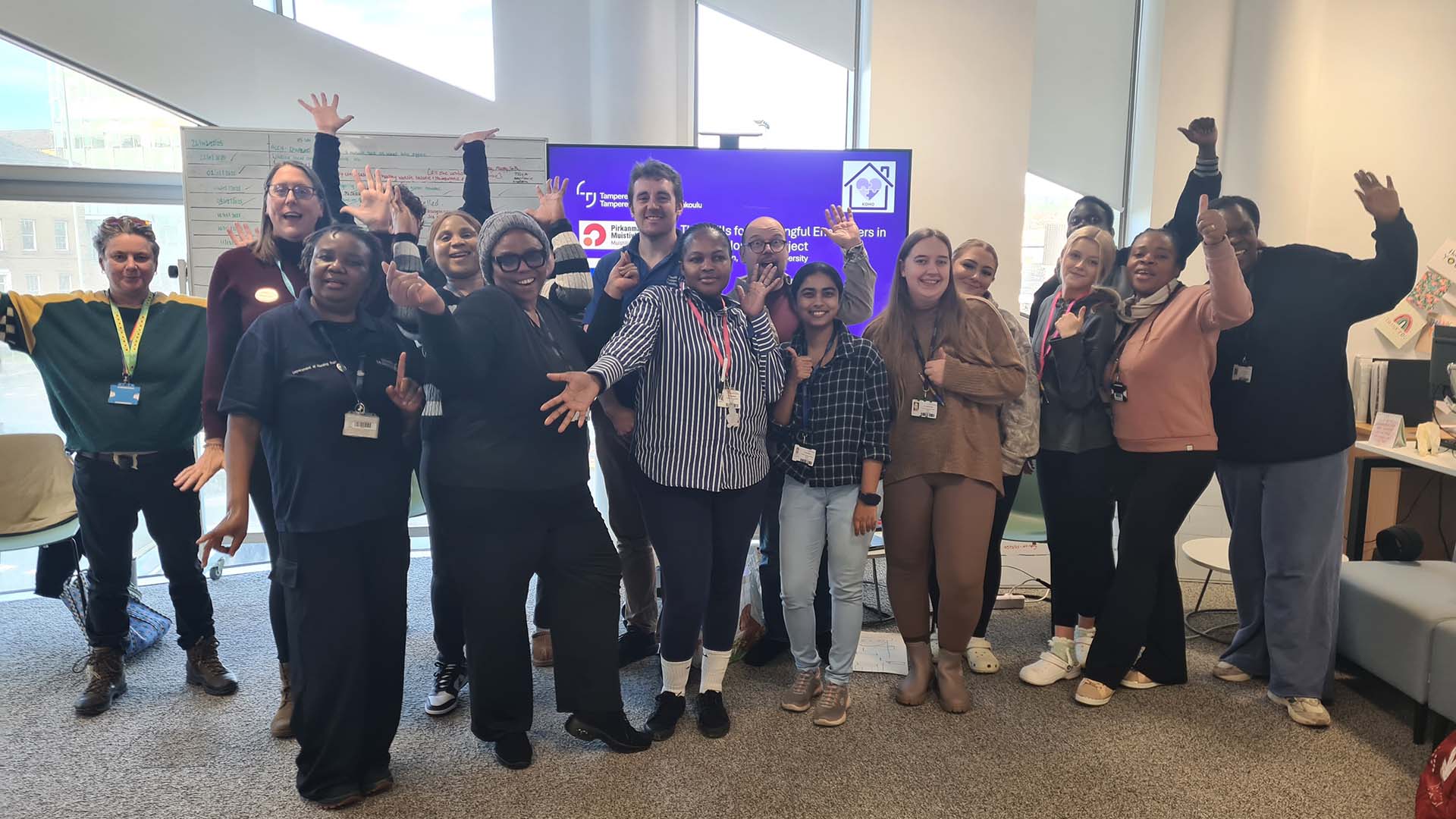 Nursing students smile at the camera in a group