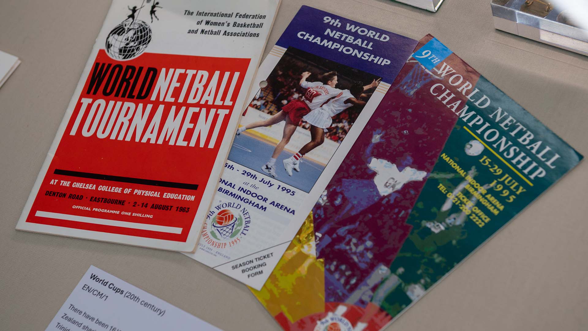 A collection of netball programmes and artefacts