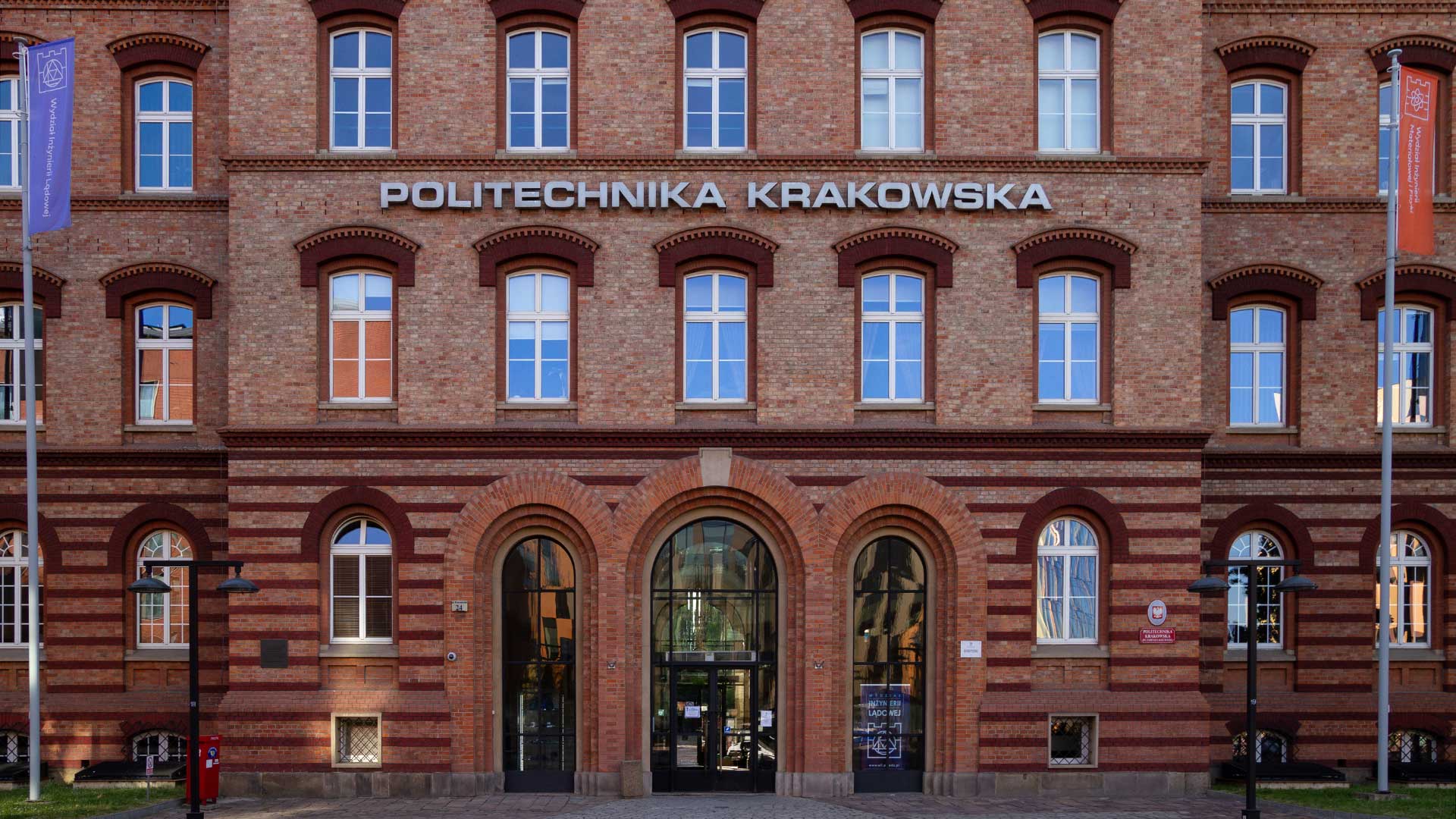 A red brick university building in Krakow, Poland