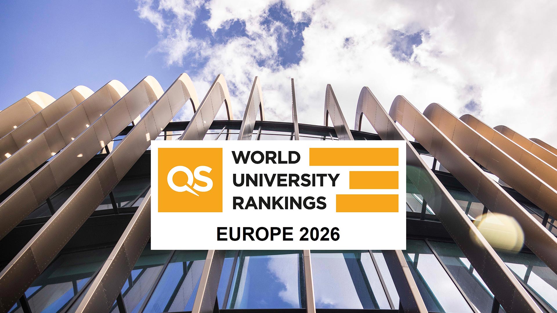 A close up of the Oastler Building at the University of Huddersfield with a QS World University Rankings: Europe 2026 logo