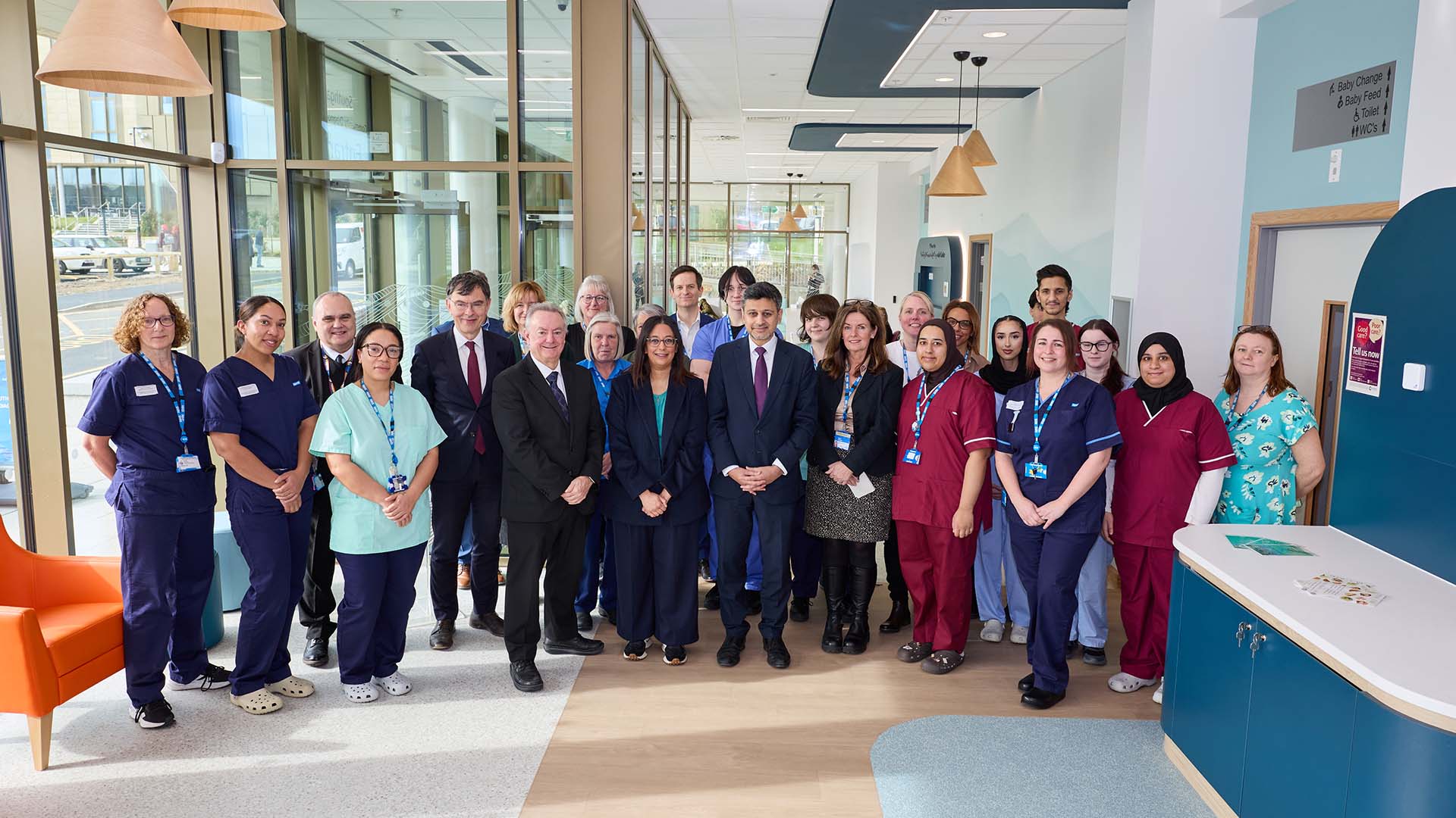 Dr Zubir Ahmed MP and a group of staff and students at the community diagnostic centre