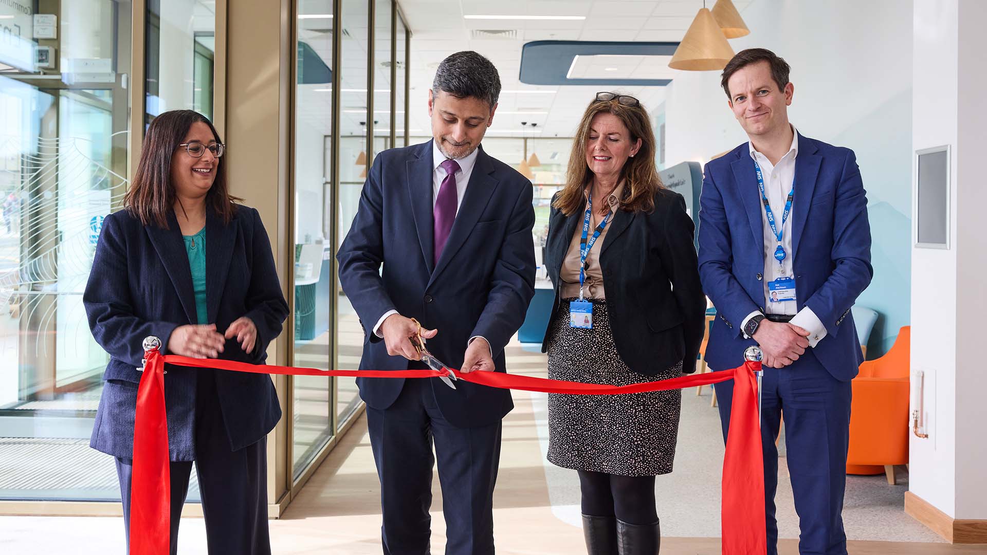 Dr Ahmed officially opens the CDC by cutting a ribbon