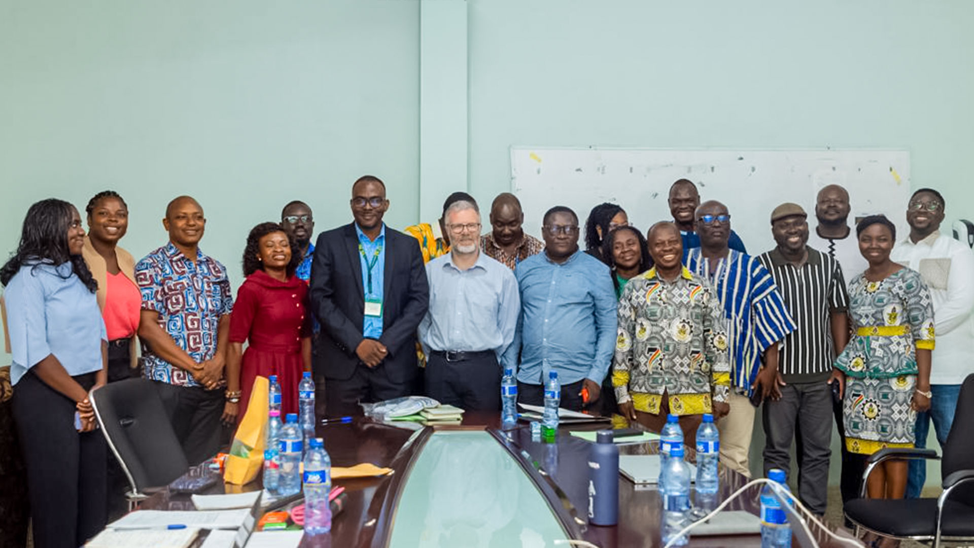 A group of people gathered in a room in Ghana
