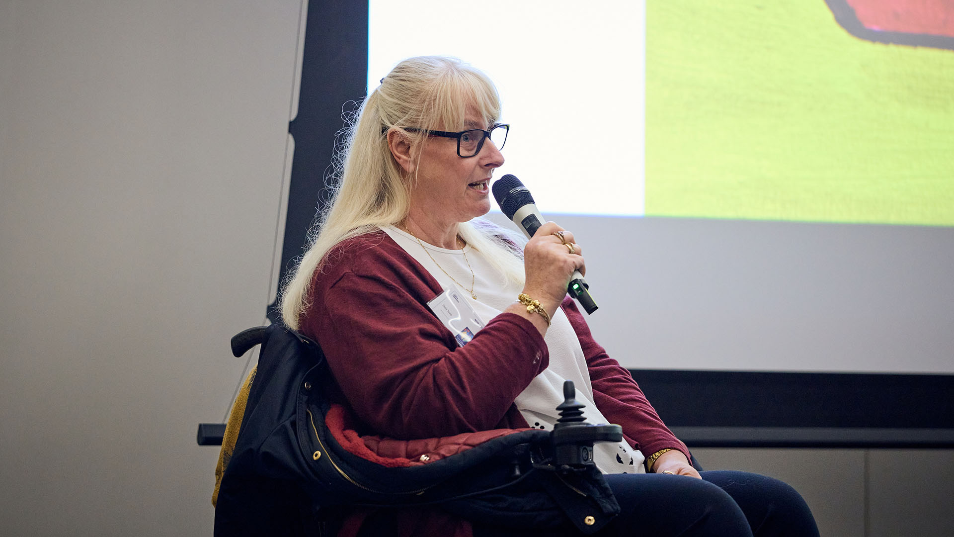 Debs Teale speaks at a conference