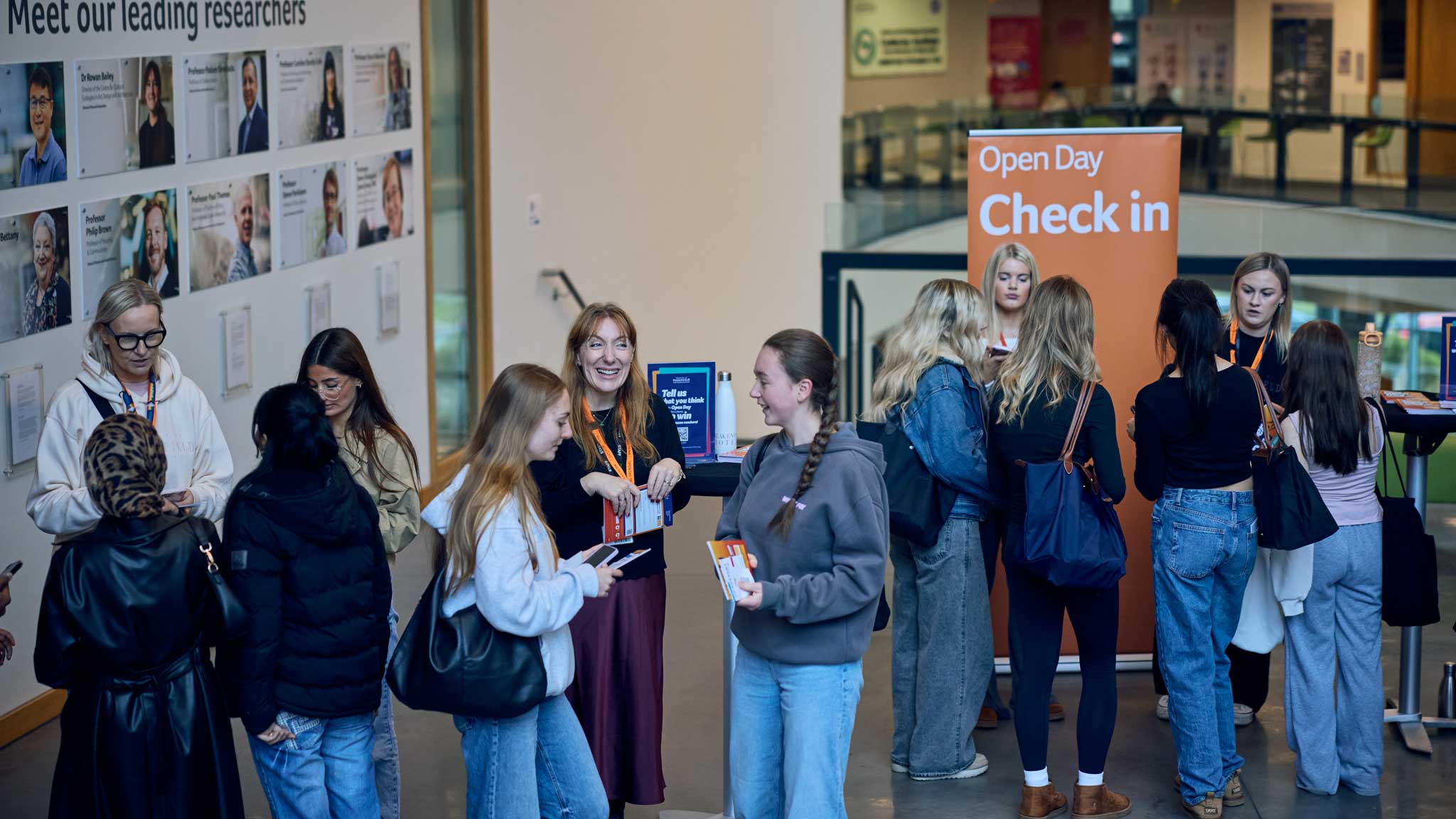 A group of prospective students checking into the University of Huddersfield's open day