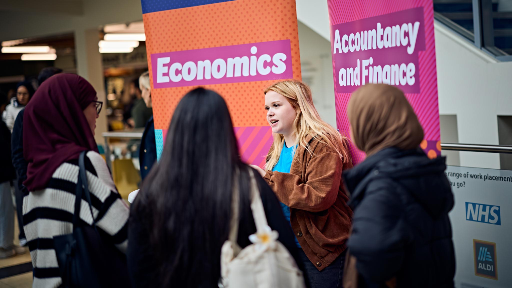 Prospective students talking to one of our student ambassadors
