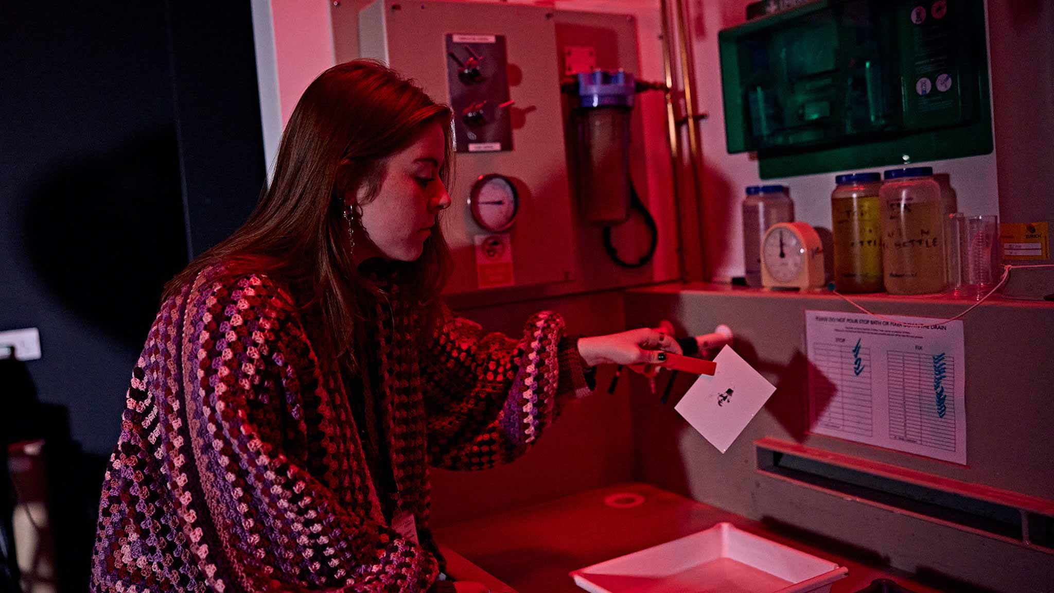 Placement student working in a dark room