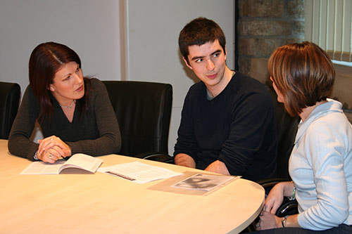 Ben Gouldstone talking to staff about placements