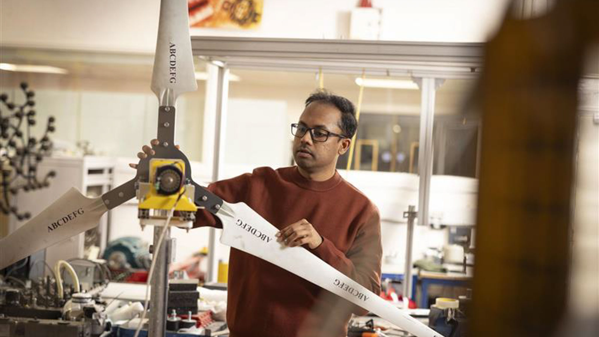 Student working on wind turbine sustainable engineering project