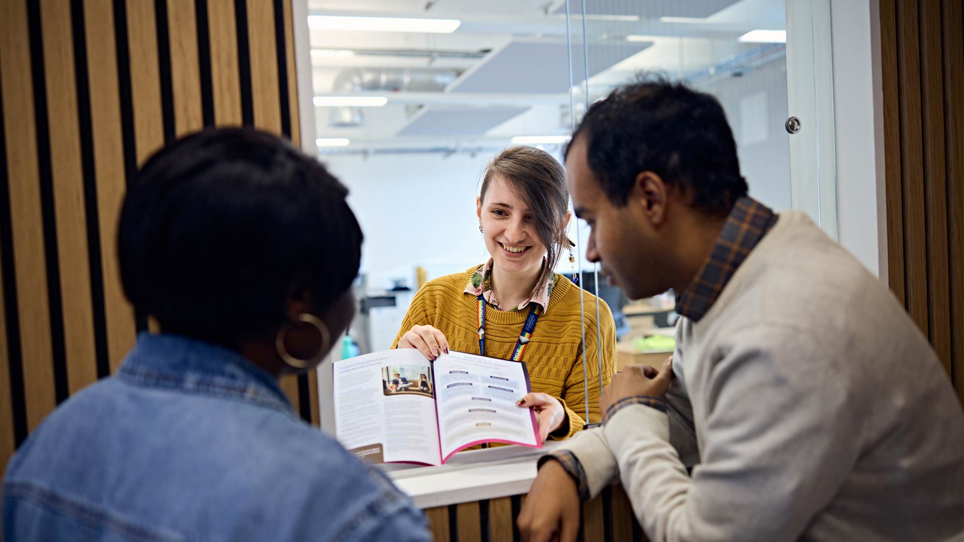 Staff in Doctoral College supporting prospective researchers and running through available opportunities