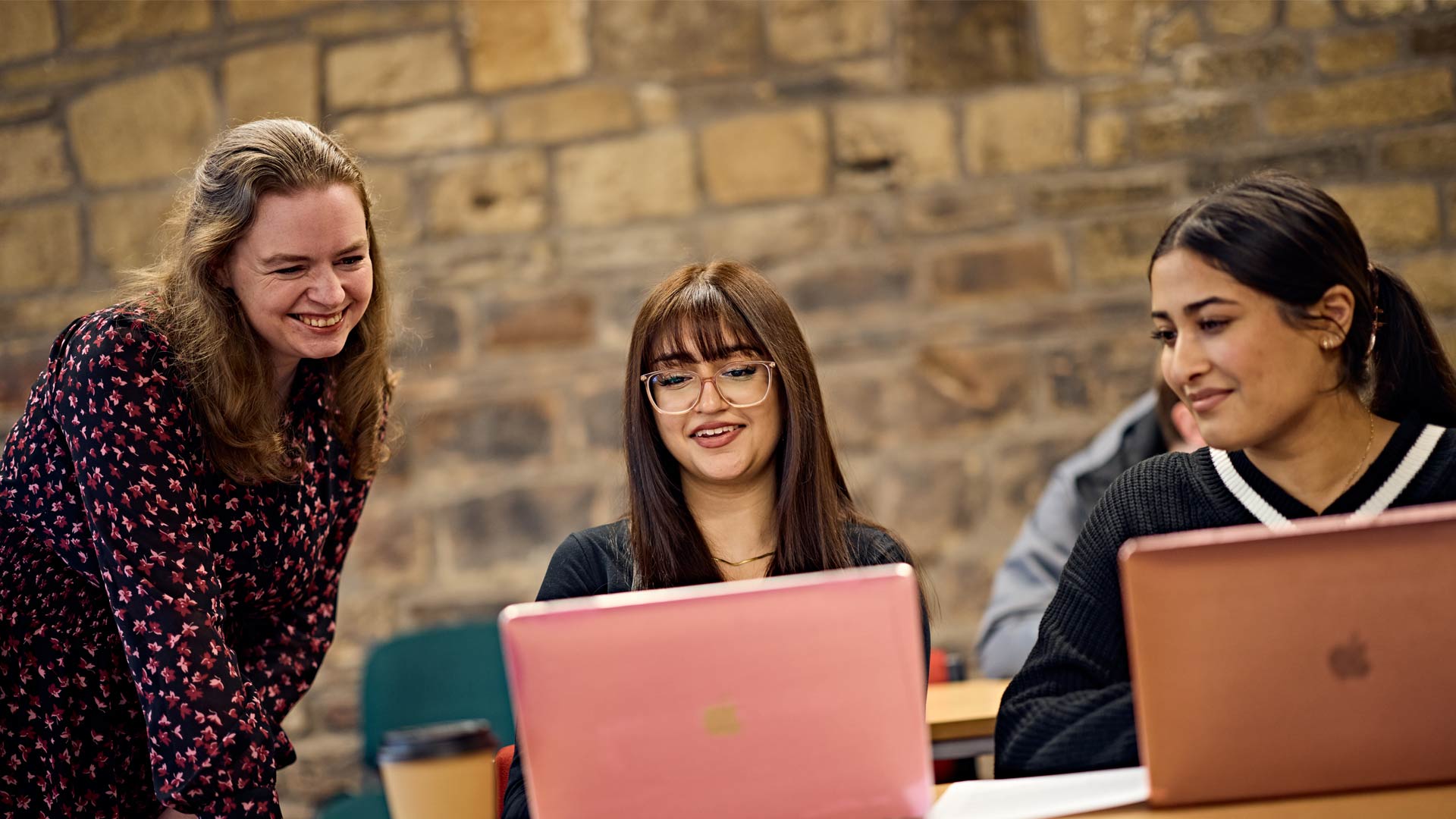 Students working with academic in Law seminar