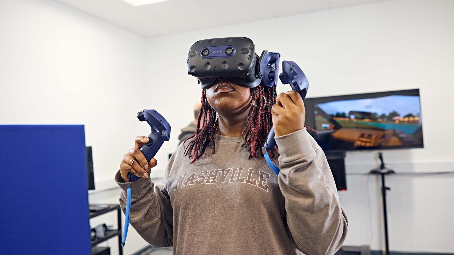 Psychology student wearing a VR headset