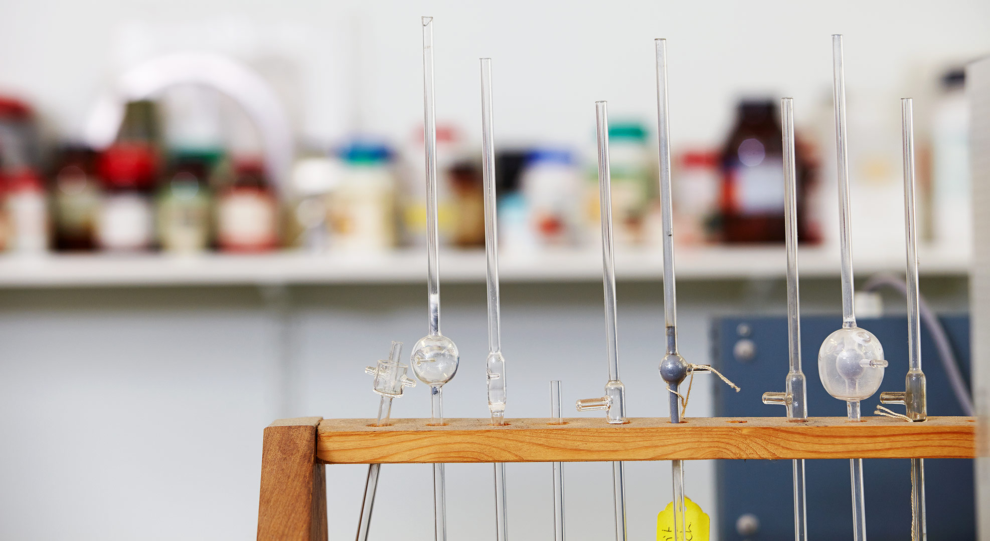 Scientific equipment stood in a test tube rack