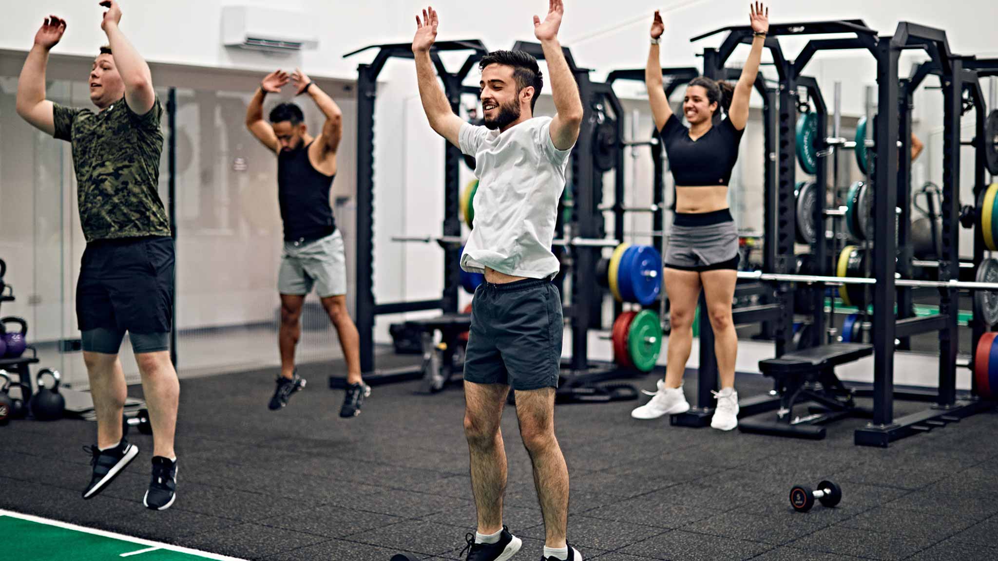 Multiple students at a gym class