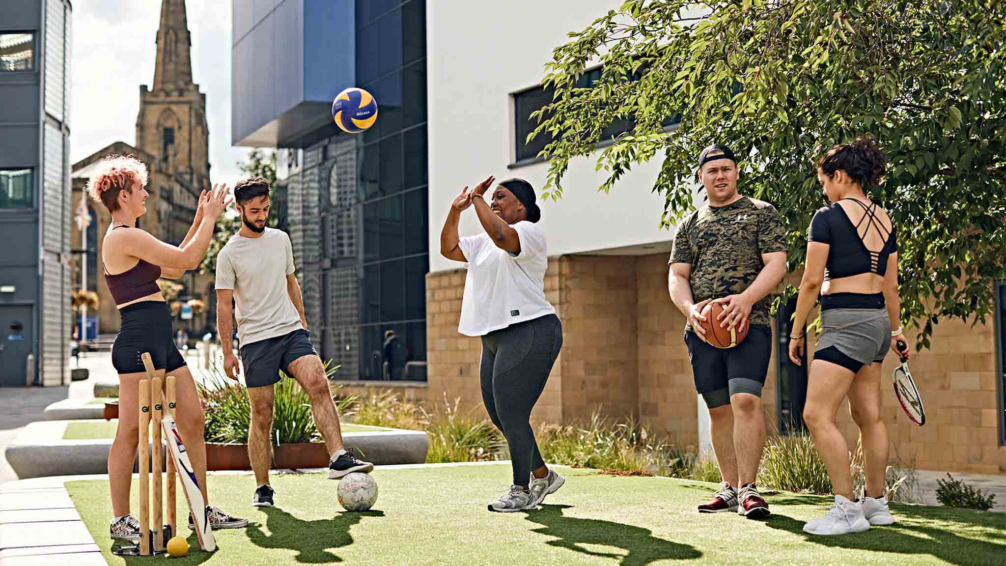 Multiple students exercising outside