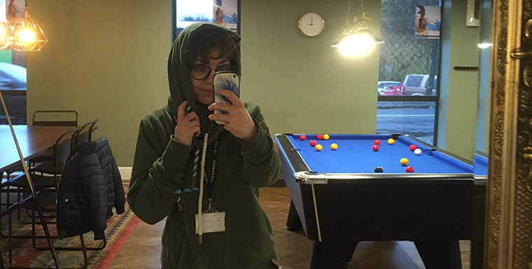 Marthe takes a selfie in a halls of residence