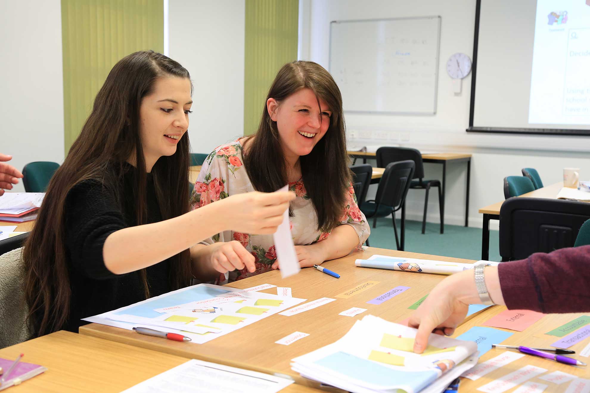 female-postgrad-students-working