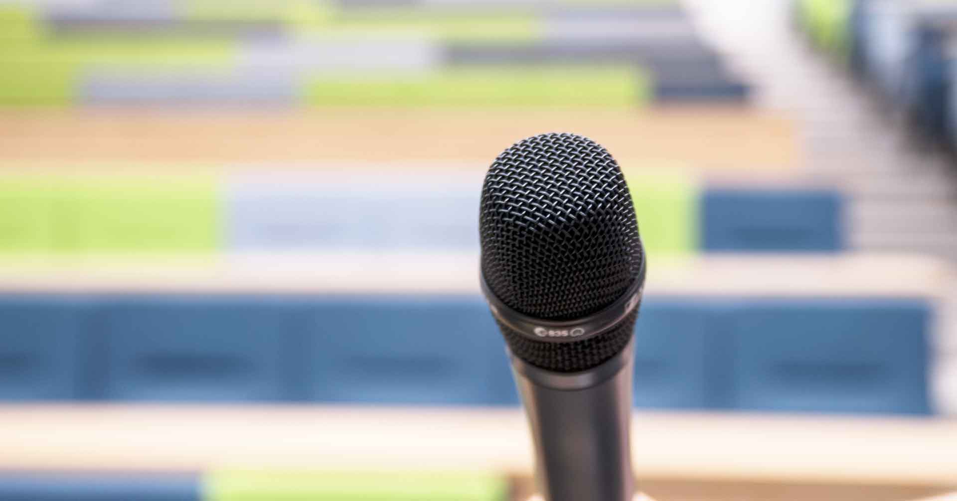 microphone in front of an empty lecture theatre