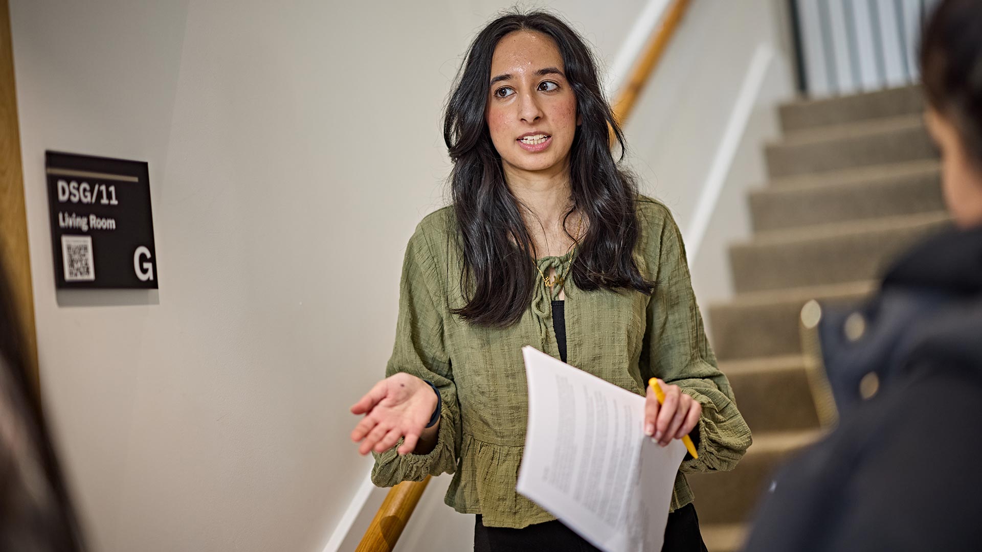 A teaching session being delivered in the Community House healthcare facility, which is a replica of a residential home.