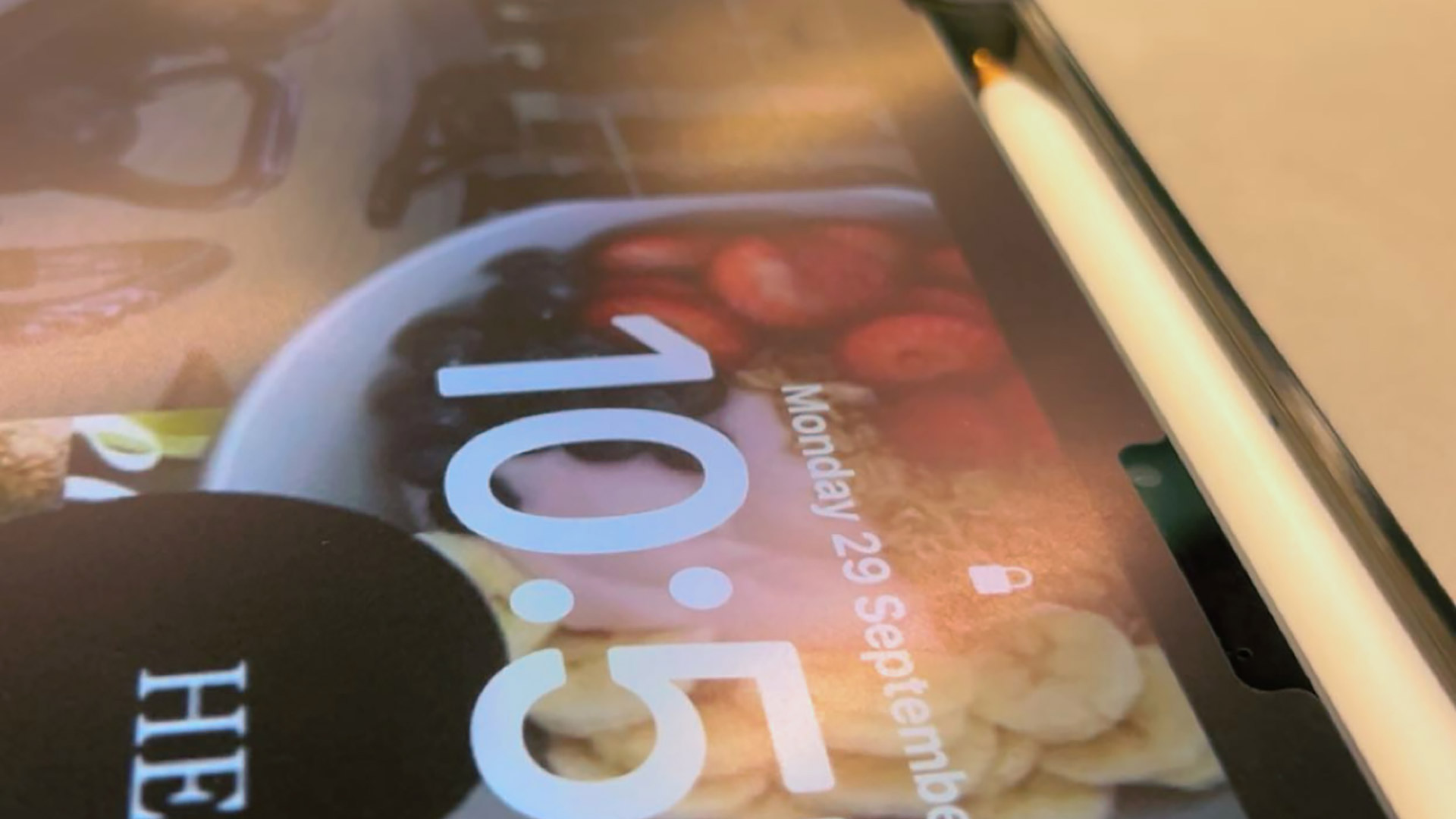 Close-up of Ayesha's tablet device with a stylus.