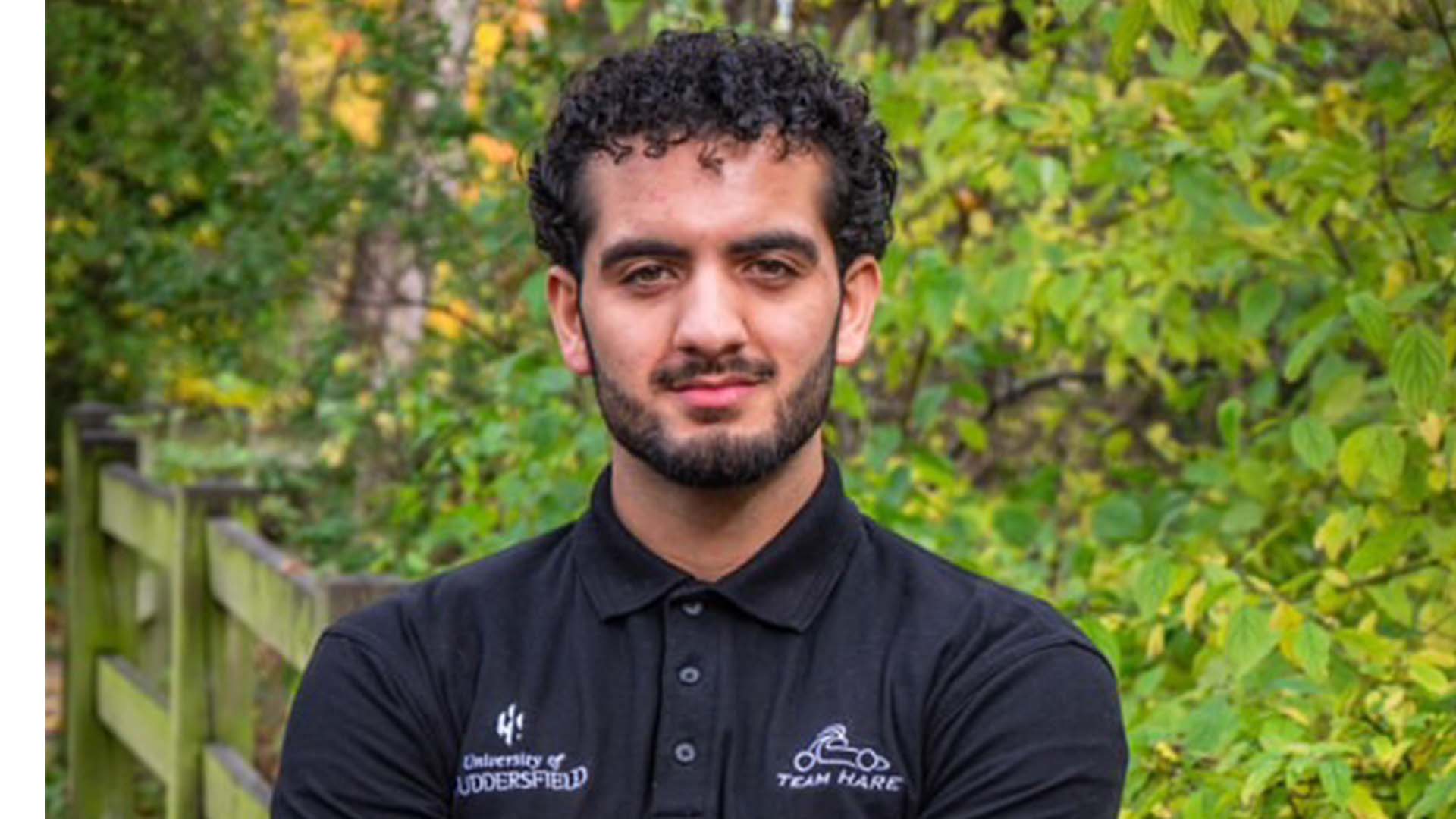 Saad Zahir smiling to the camera.