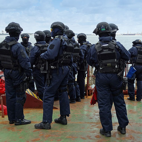 Photo of police in riot gear