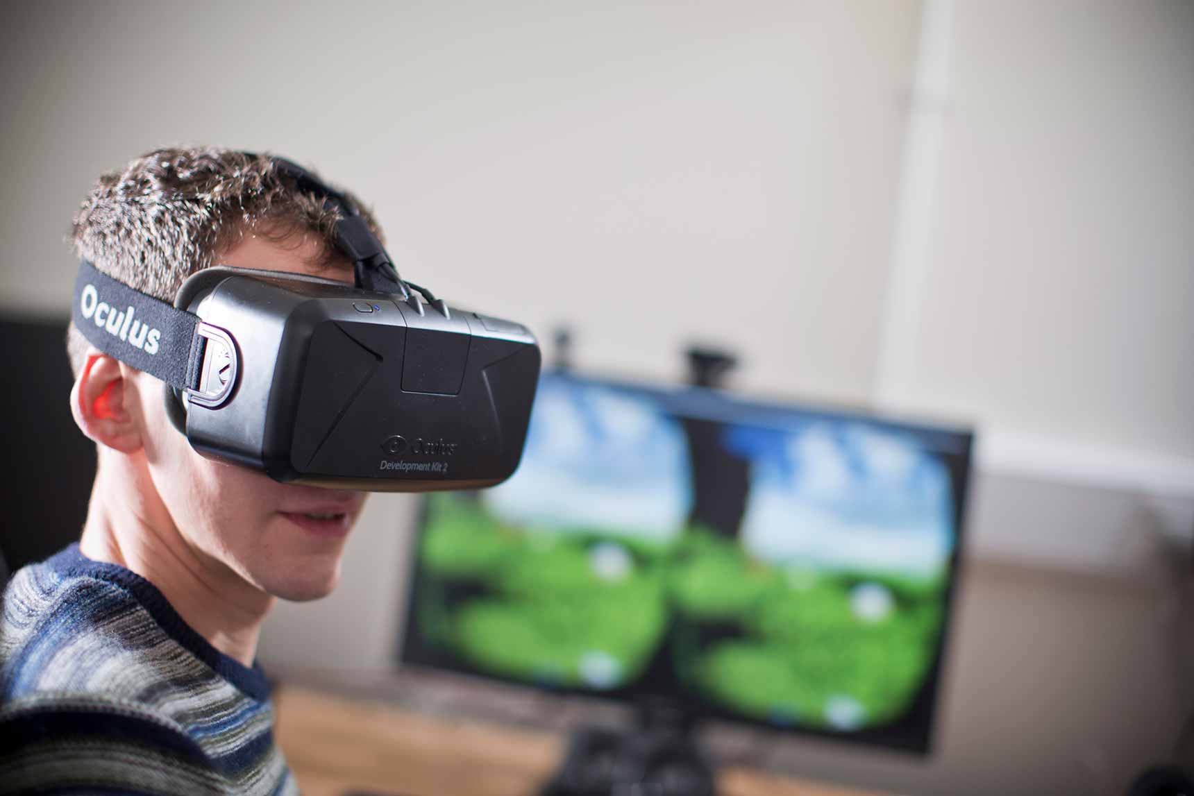 Photo of a man wearing an Occulus VR headset