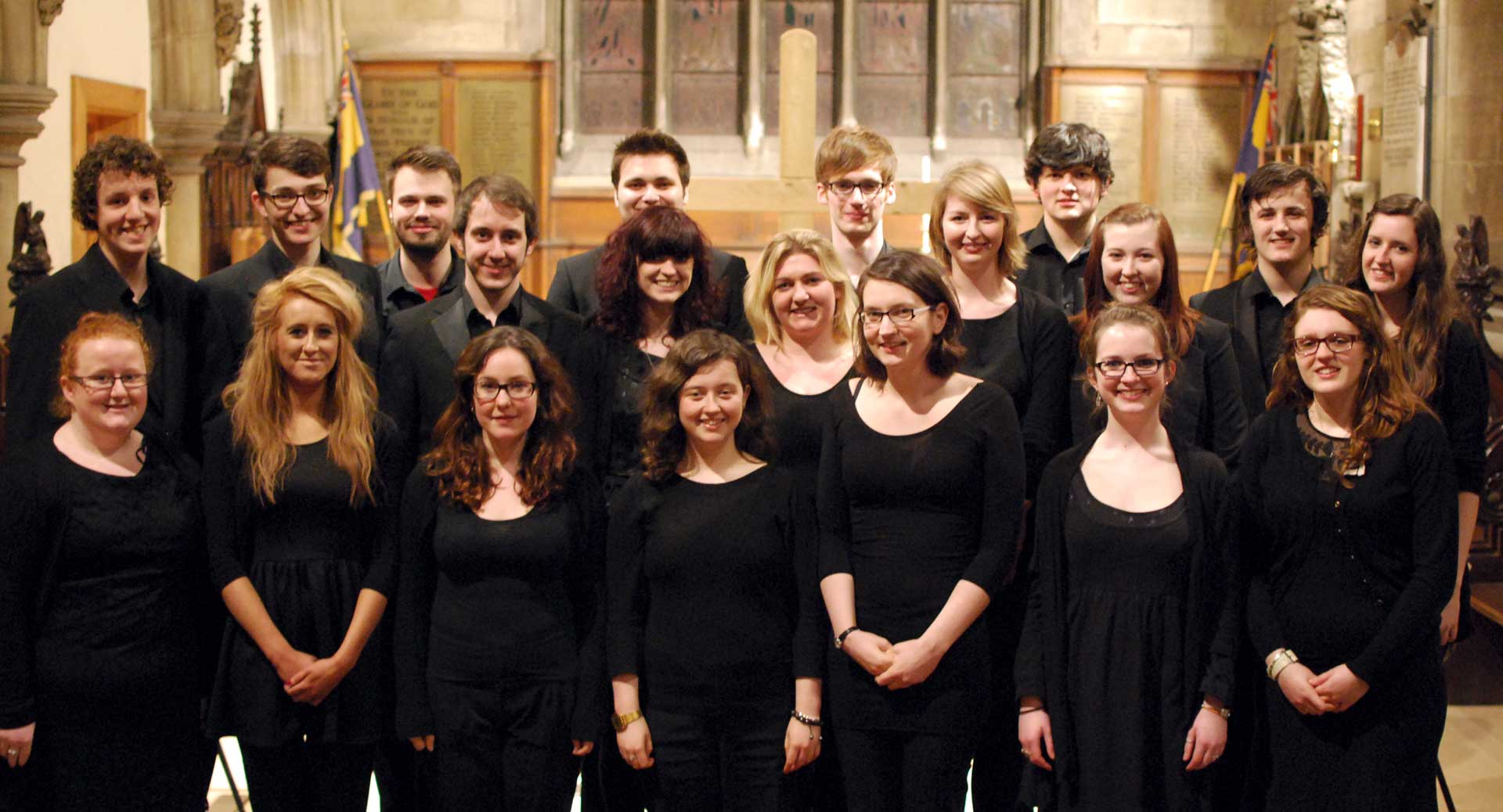 A choir made of up for people dressed in black.